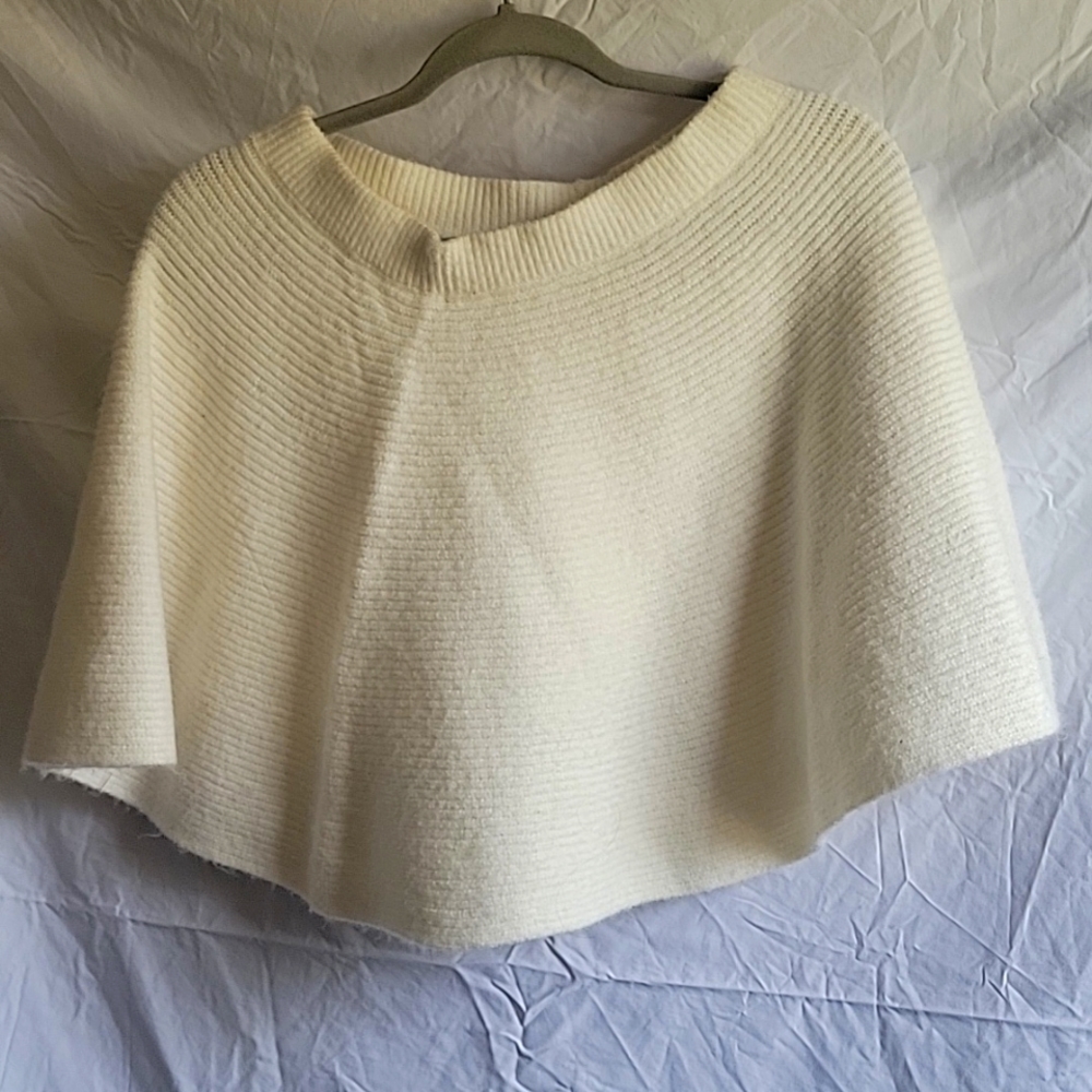 Cream colored, poncho!